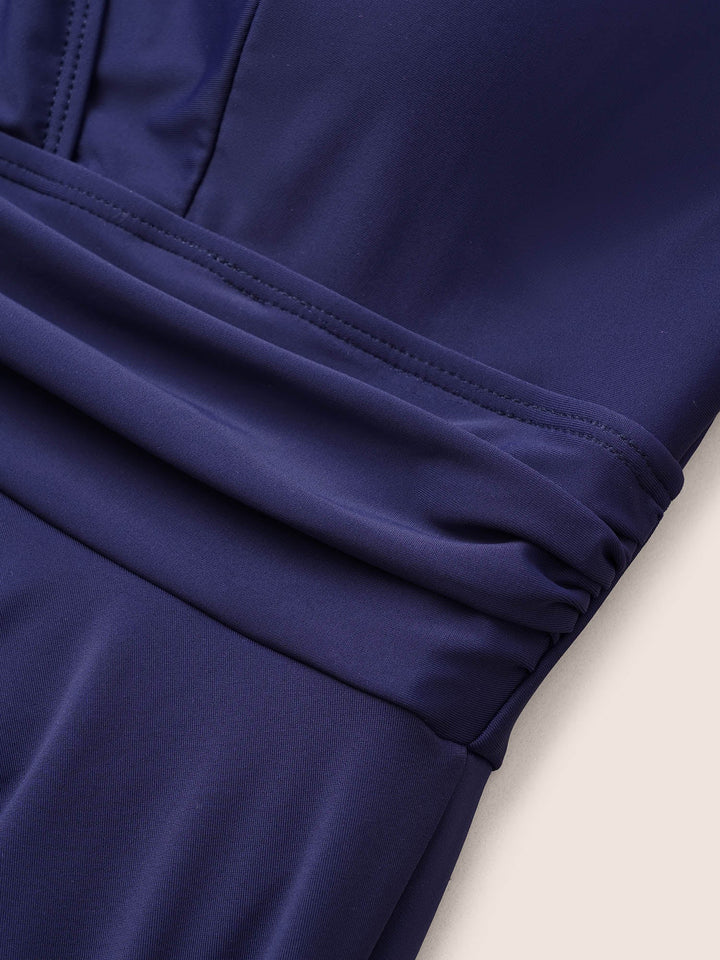 Celestine™ – Ruffle Hem Halter Neck Swim Dress