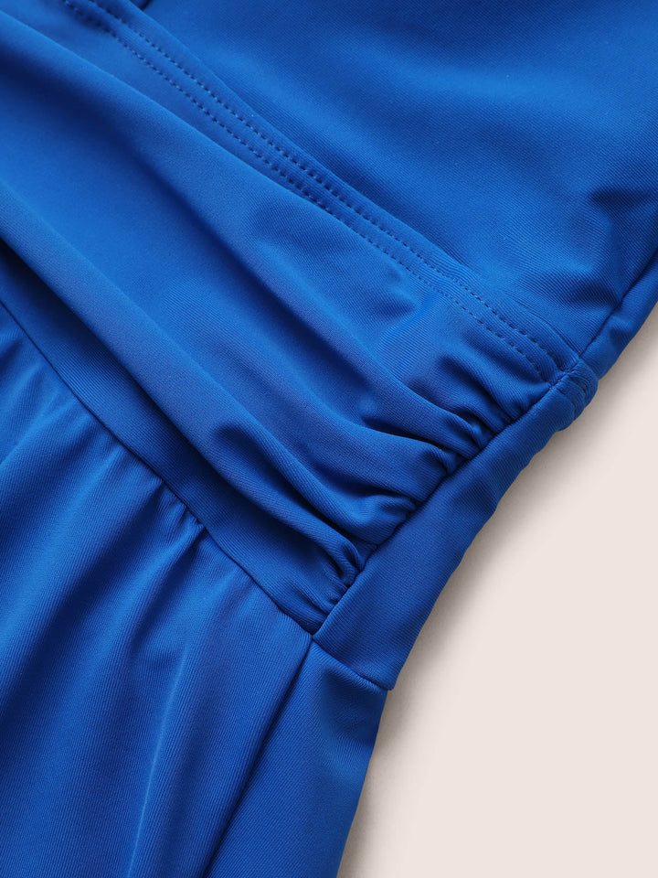 Celestine™ – Ruffle Hem Halter Neck Swim Dress